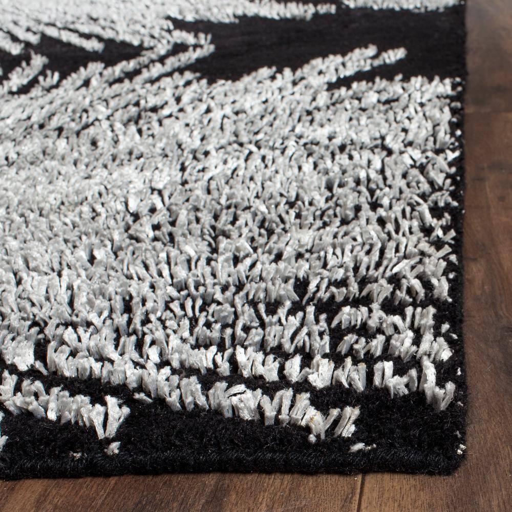 Soho SOH712 Hand Tufted Indoor Accent Rug - Black/White - 2'x3' - Safavieh.