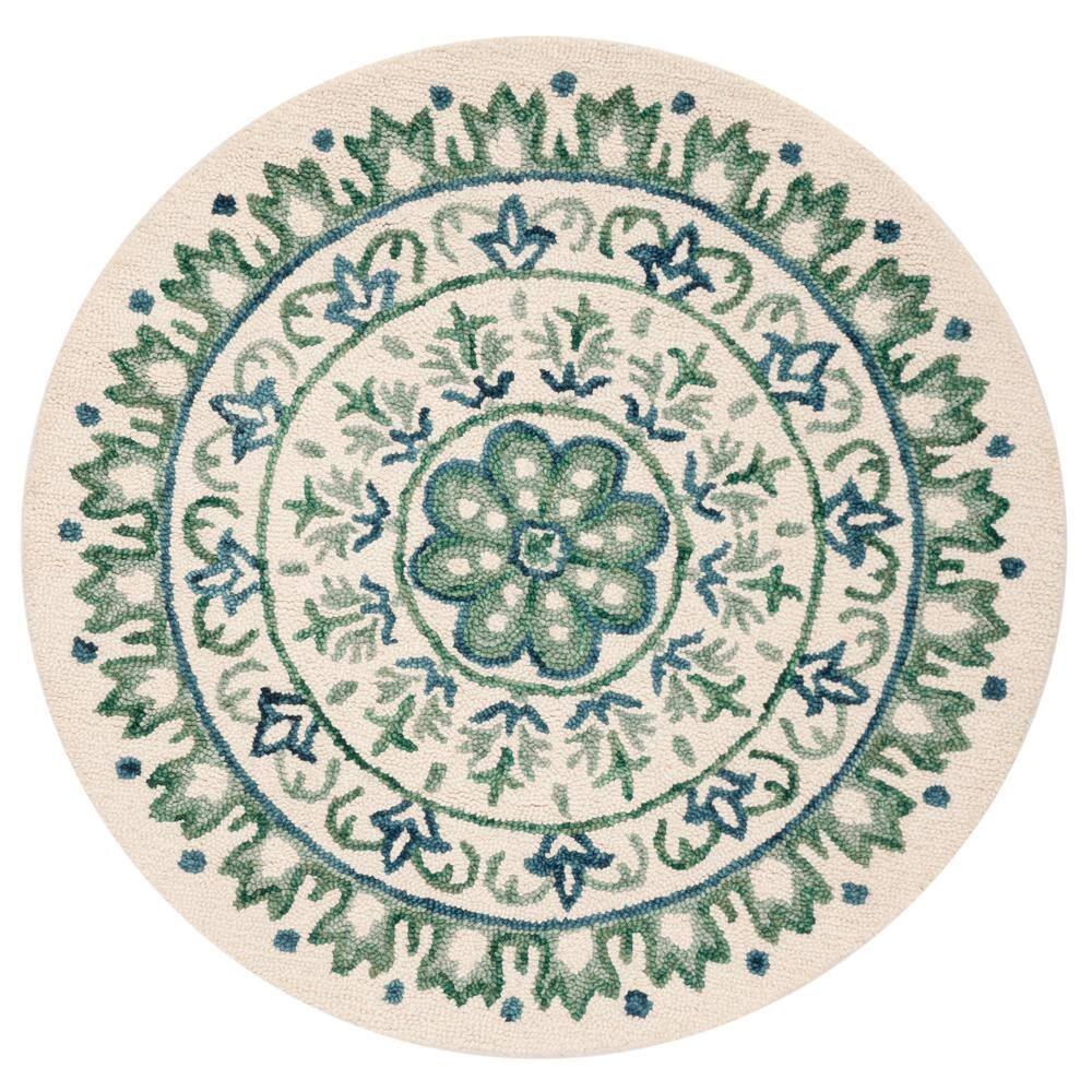 Novelty NOV607 Hand Tufted Area Rug - Ivory/Teal - 4' round - Safavieh.