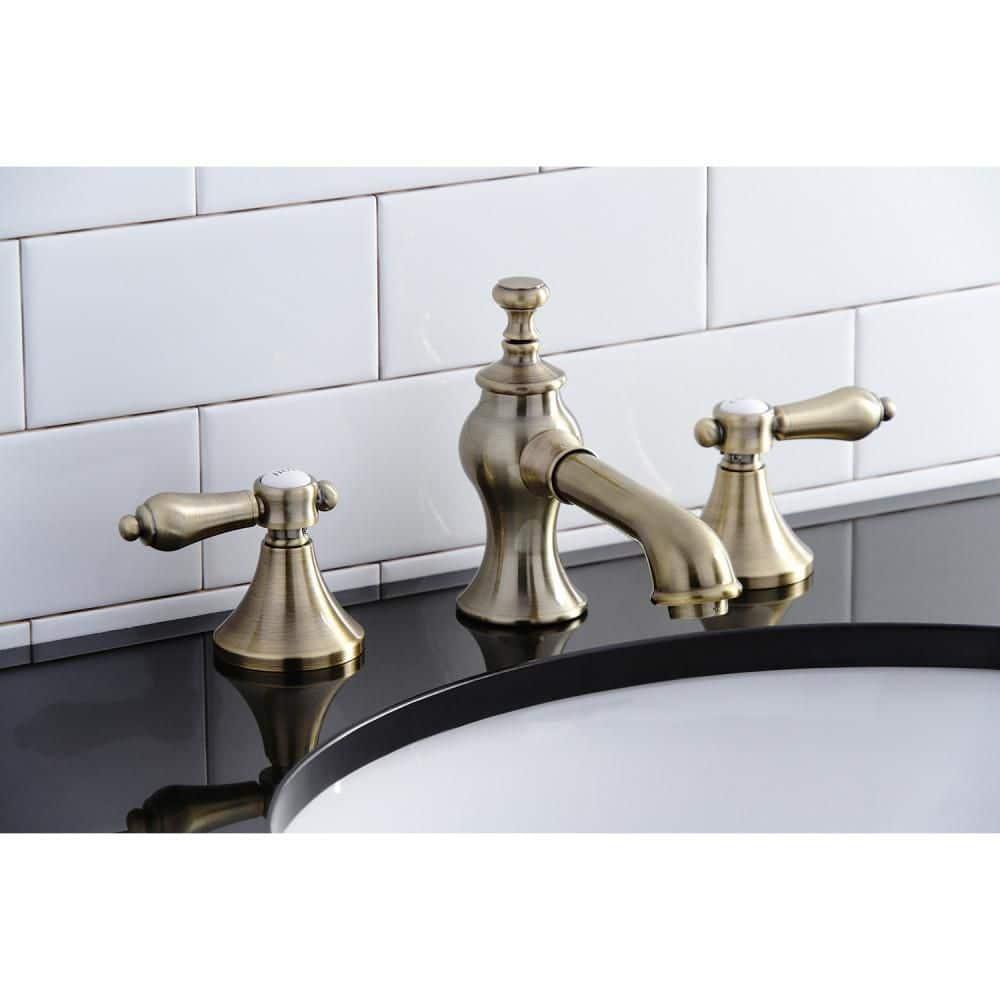 Kingston Brass Vintage Two-Handle 3-Hole Deck Mount Widespread Bathroom Faucet with Brass Pop-Up Drain
