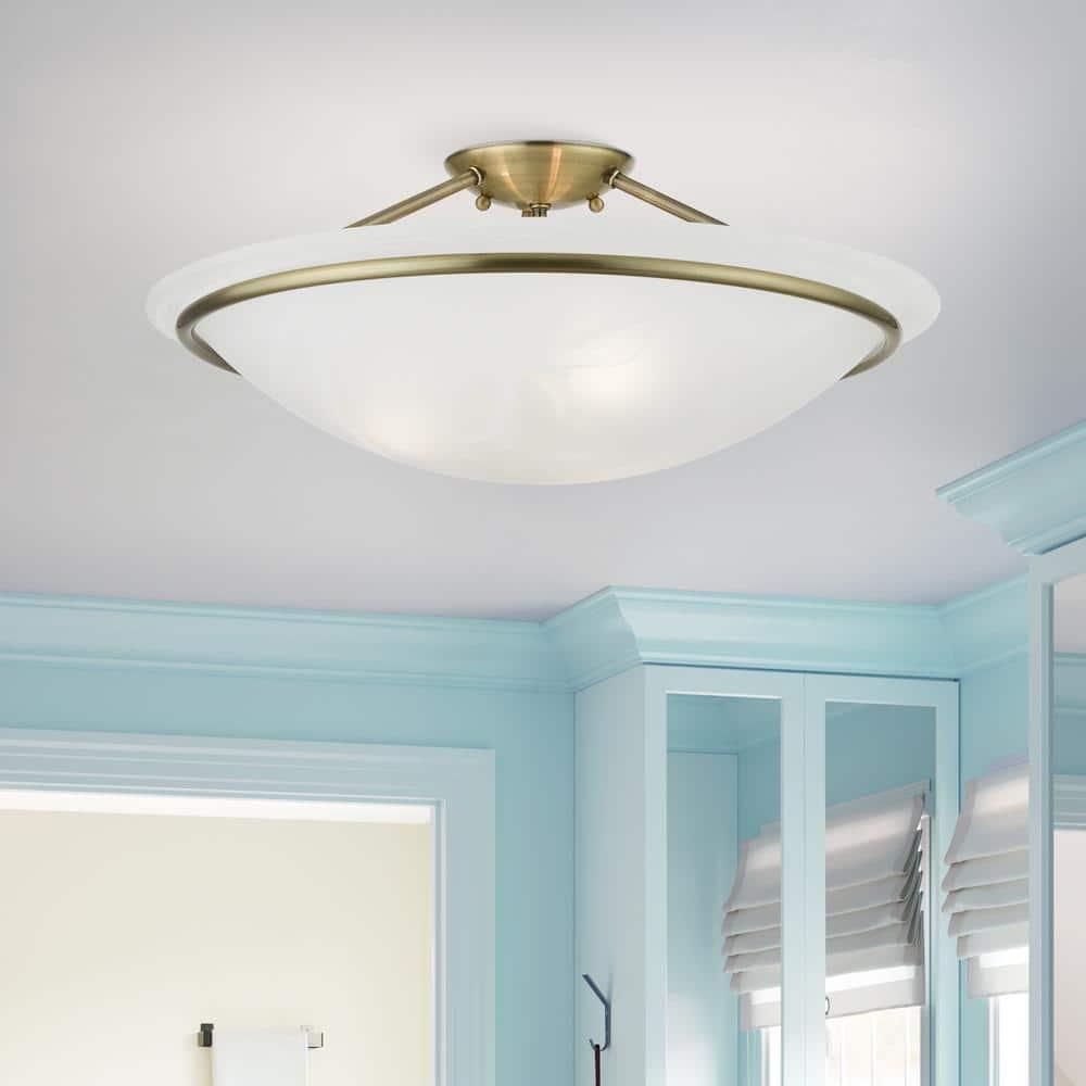 Livex Lighting Newburgh 3 - Light Semi-Flush Mount in  Antique Brass