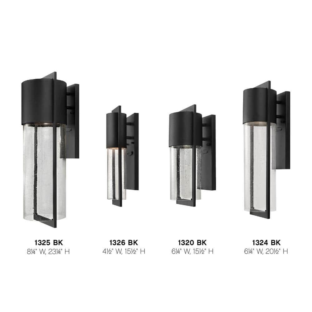 Sleek Black Outdoor Wall Sconce with Clear Seedy Glass