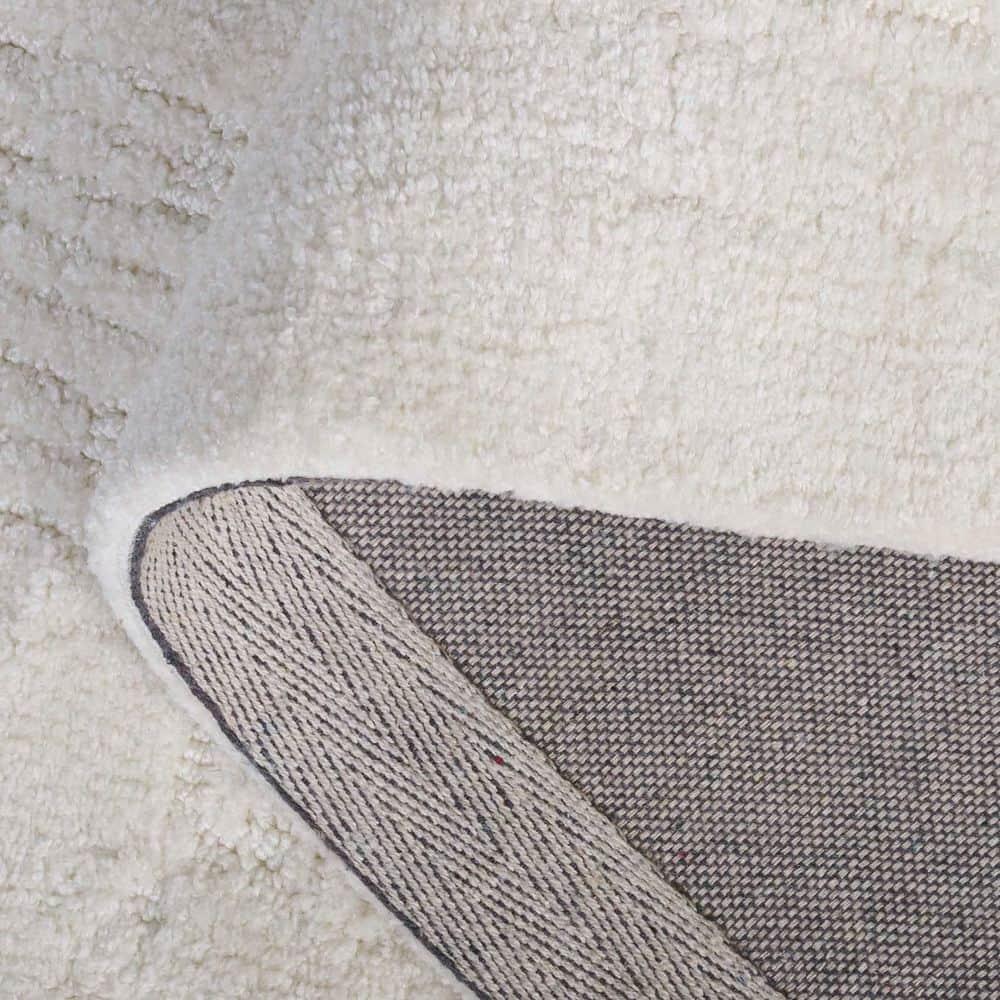 Audrey 4 ft. x 6 ft. Ivory Solid Abstract Area Rug
