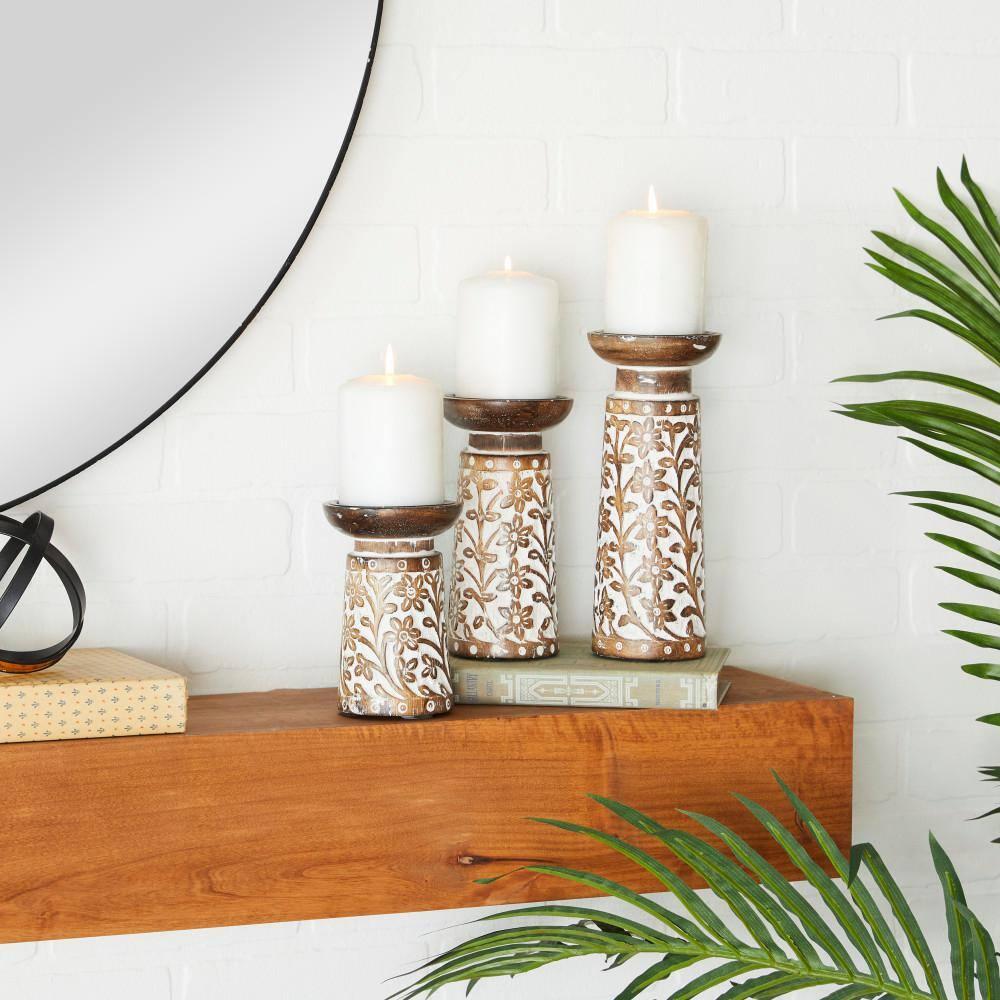 Gracie Oaks Mango Wood Floral Handmade Decorative Candle Holder Carved Pillar Candle Stand With Cream Accents, Set Of 3 Candlestick Holder 6", 8", 10"H, Brown
