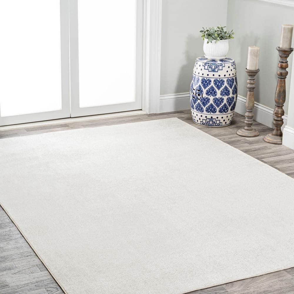 JONATHAN Y Twyla Classic Solid Low-Pile Machine-Washable Cream 4 ft. x 6 ft. Area Rug
