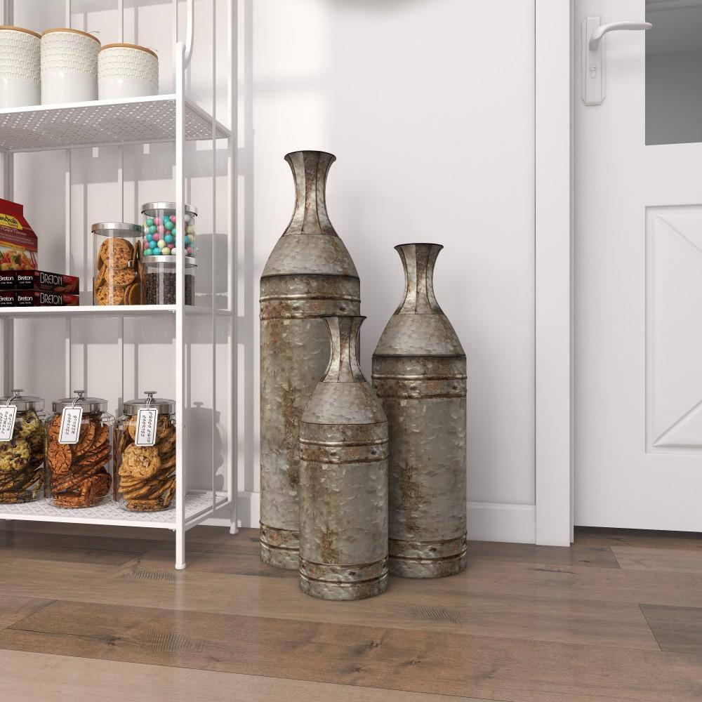 DecMode Farmhouse Cylinder Shape Extra Large Silver Distressed Metal Floor Vases, Set of 3, 43", 33", 25"H
