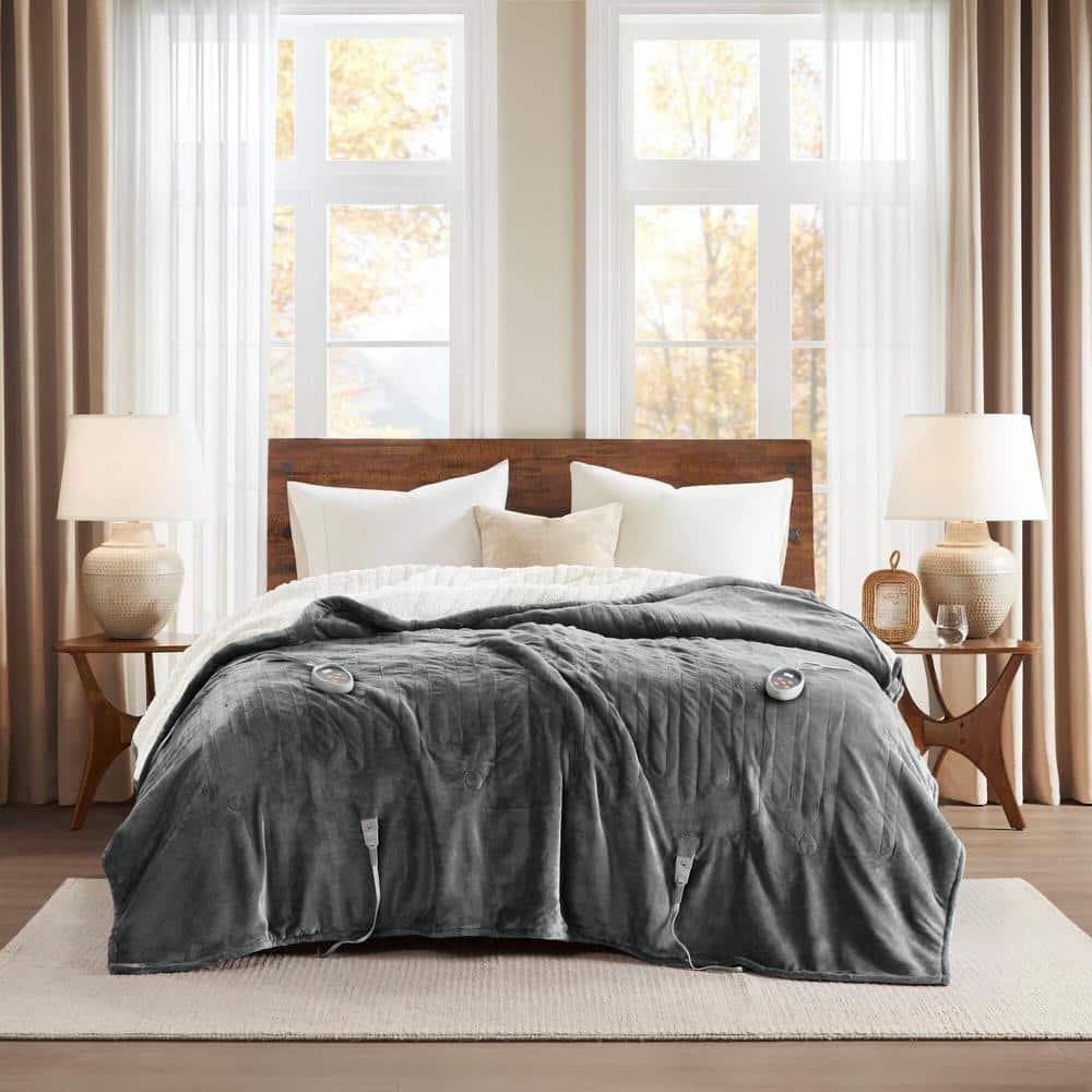 Woolrich Heated Plush to Berber Blanket