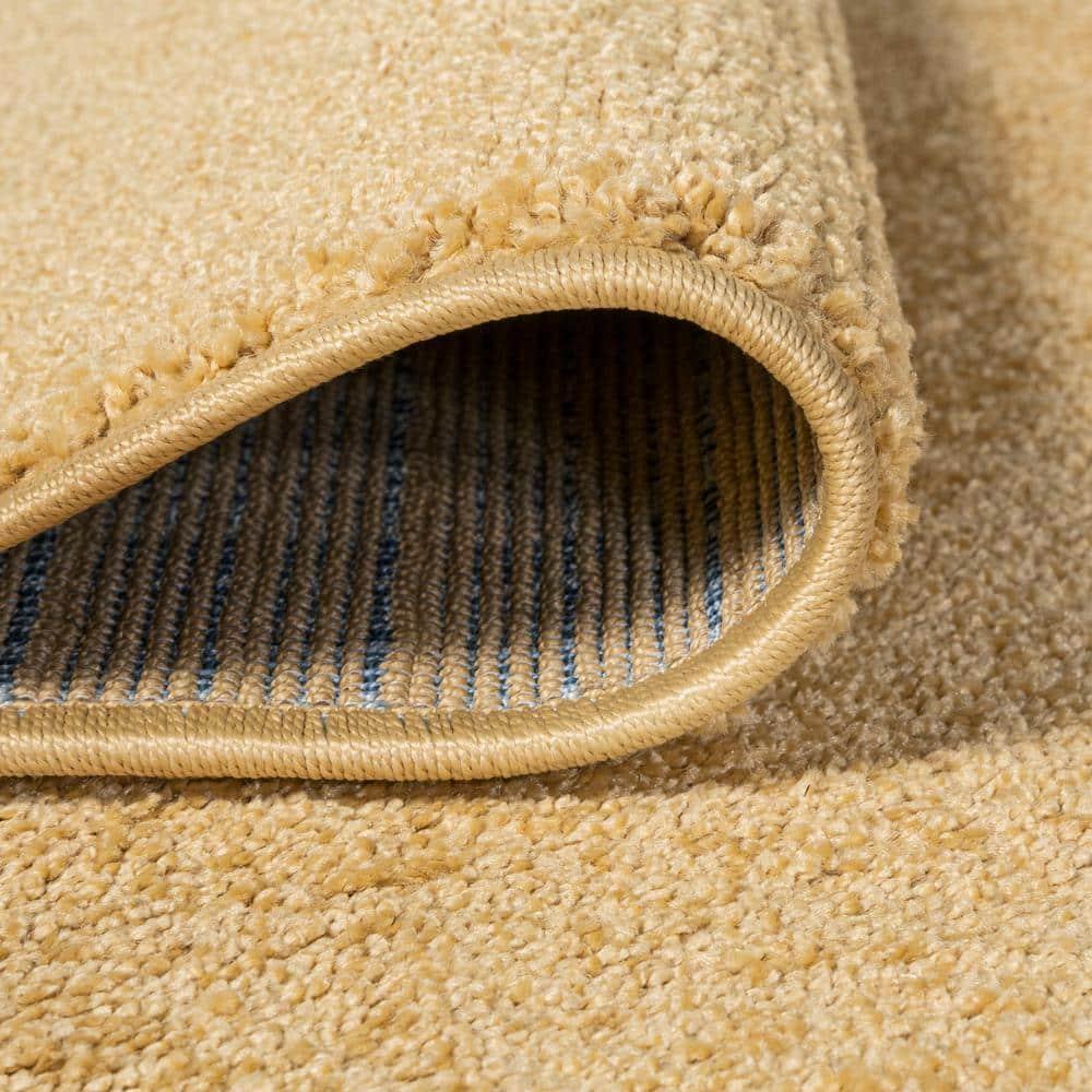 8'x10' Haze Solid Low-Pile Area Rug, Mustard - JONATHAN Y