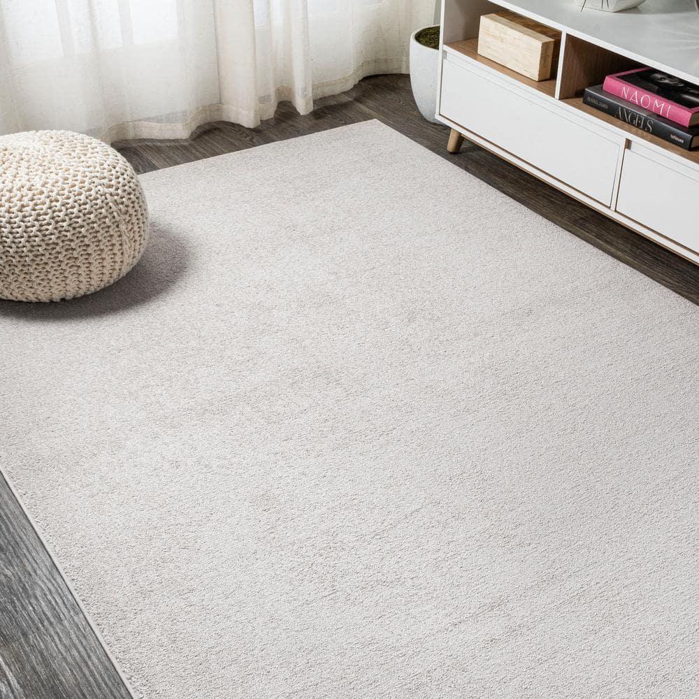 8'x10' Haze Solid Low-Pile Area Rug, Ivory - JONATHAN Y