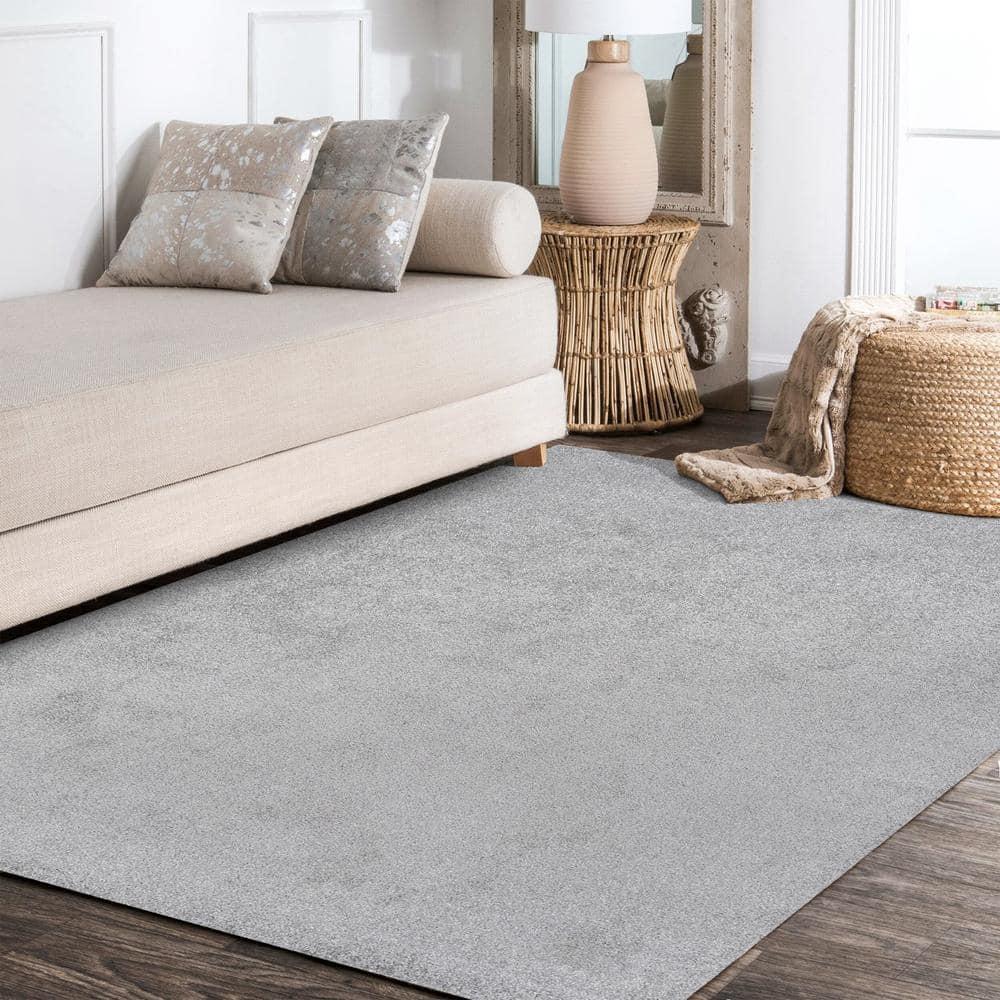 8'x10' Haze Solid Low-Pile Area Rug, Light Gray - JONATHAN Y