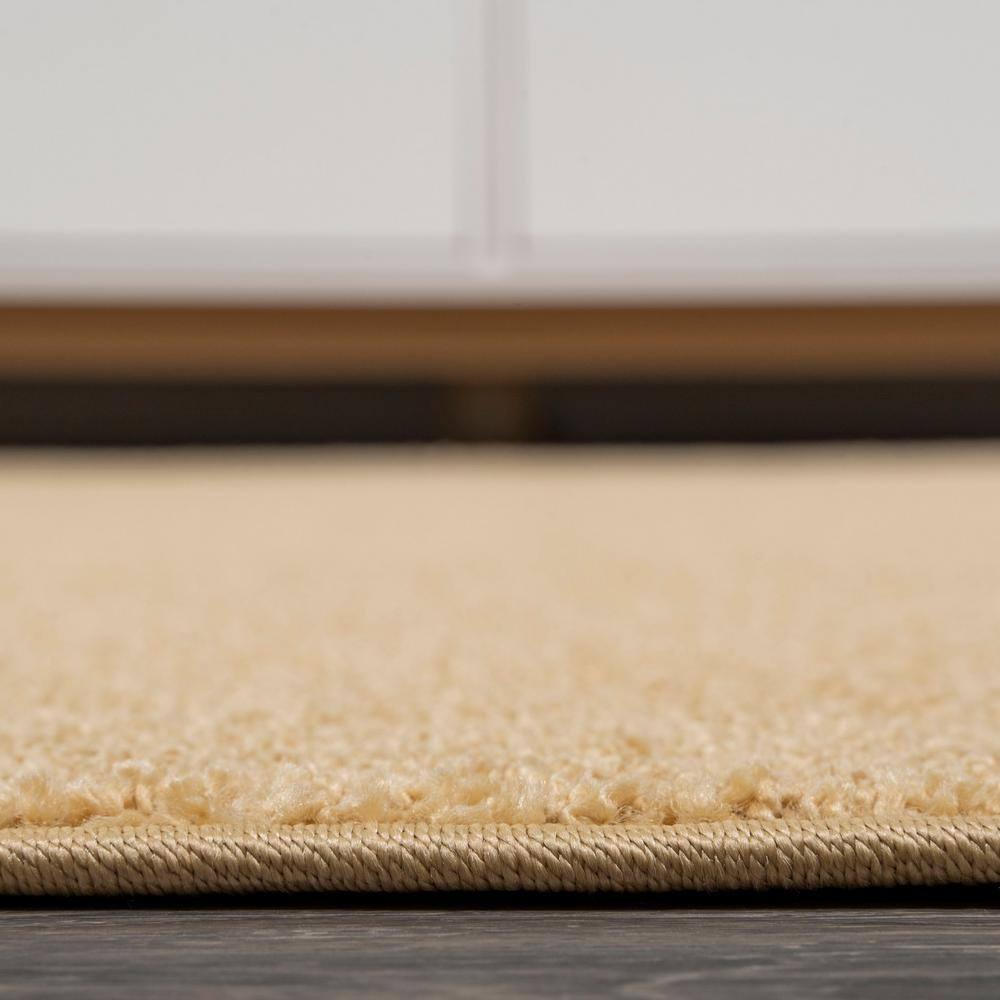 8'x10' Haze Solid Low-Pile Area Rug, Mustard - JONATHAN Y