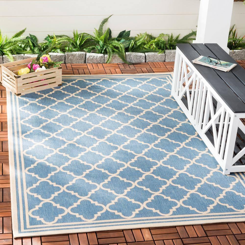 Blue and Cream Geometric 9' x 12' Synthetic Area Rug