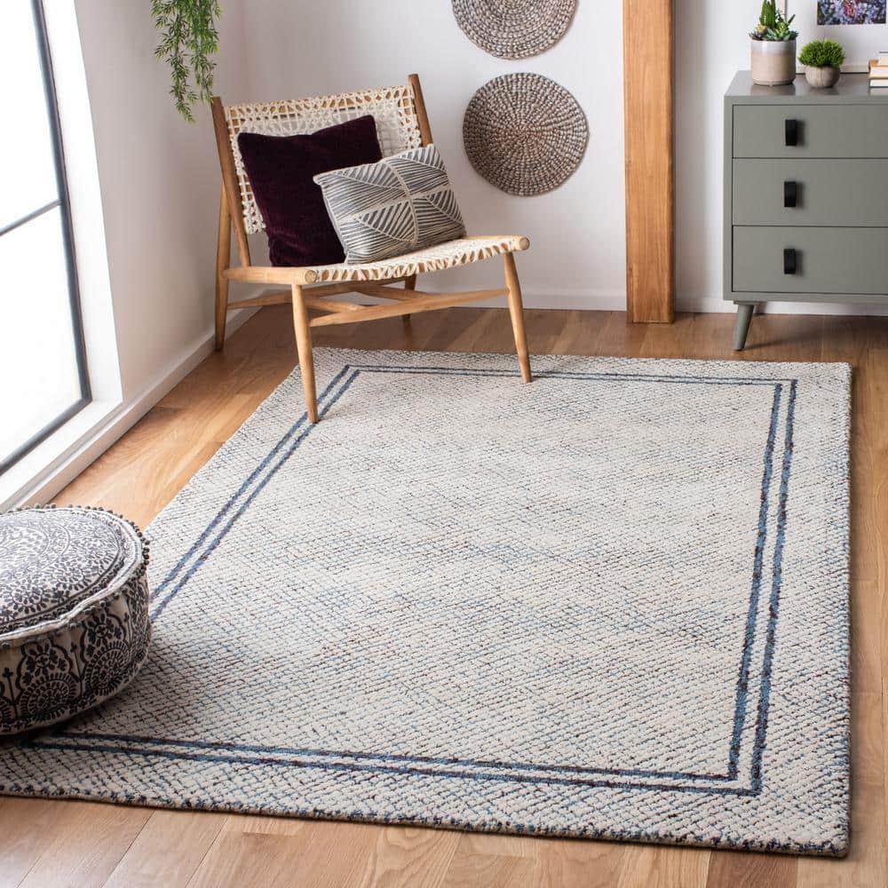 Ivory and Navy Handmade Wool Abstract Tufted Rug, 10' x 14'