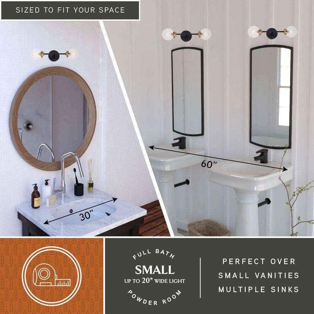 Vaxcel Orbit 2 Light Brass and Oil Rubbed Bronze Industrial MCM Wall Sconce Clear Glass Globe