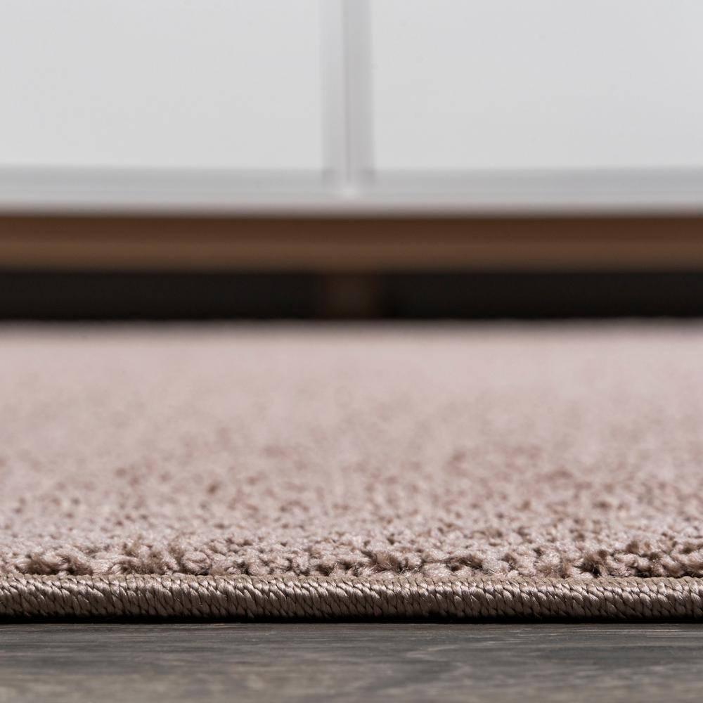 5'x8' Haze Solid Low-Pile Area Rug, Brown - JONATHAN Y