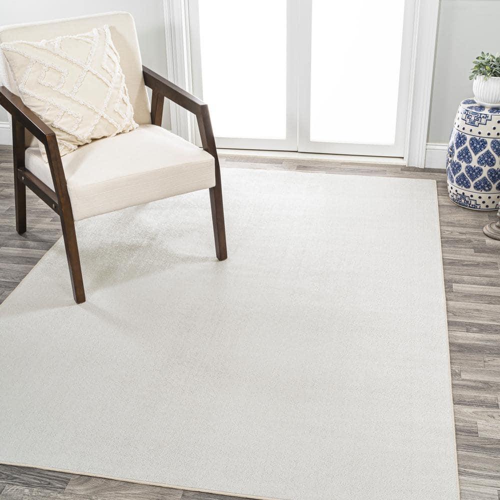 JONATHAN Y Twyla Classic Solid Low-Pile Machine-Washable Cream 4 ft. x 6 ft. Area Rug