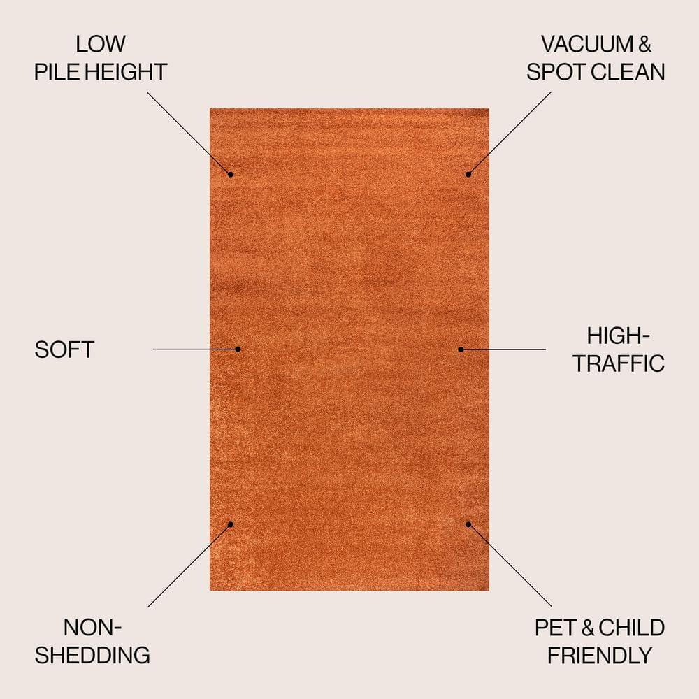 8'x10' Haze Solid Low-Pile Area Rug, Orange - JONATHAN Y