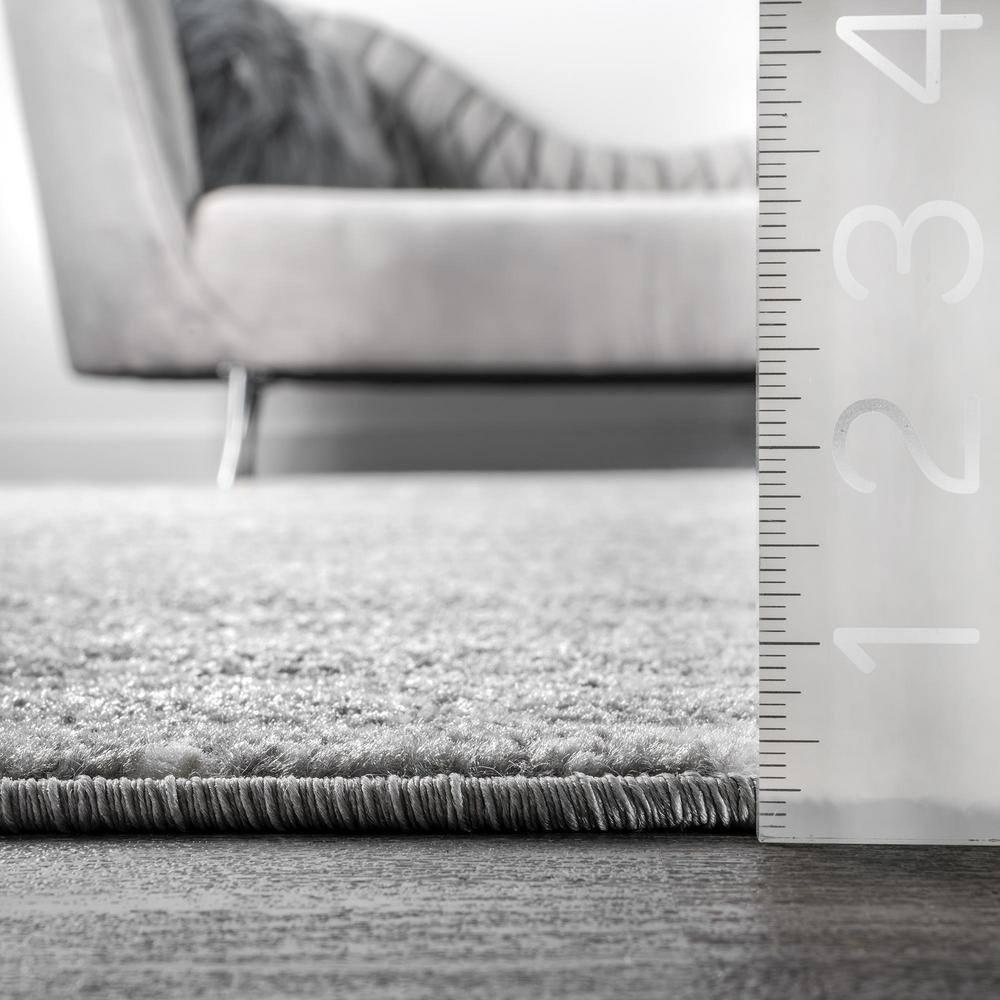 Handmade Dark Grey Geometric Oval 5' x 7' Synthetic Rug