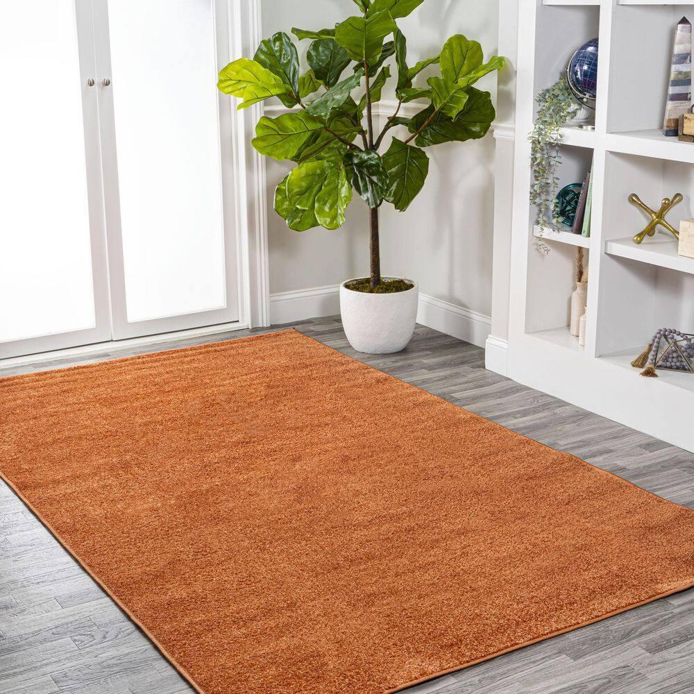 8'x10' Haze Solid Low-Pile Area Rug, Orange - JONATHAN Y