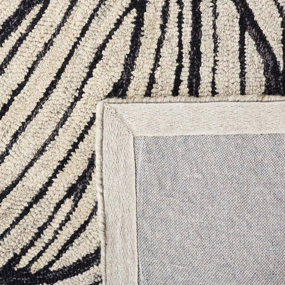 Metro MET451 Hand Tufted Indoor Area Rug - Black/Ivory - 8'x10' - Safavieh