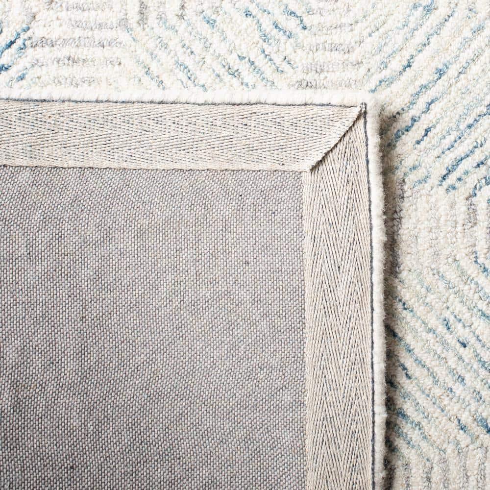 SAFAVIEH Abstract Qendro Geometric Area Rug, Ivory/Light Blue, 4' x 6'