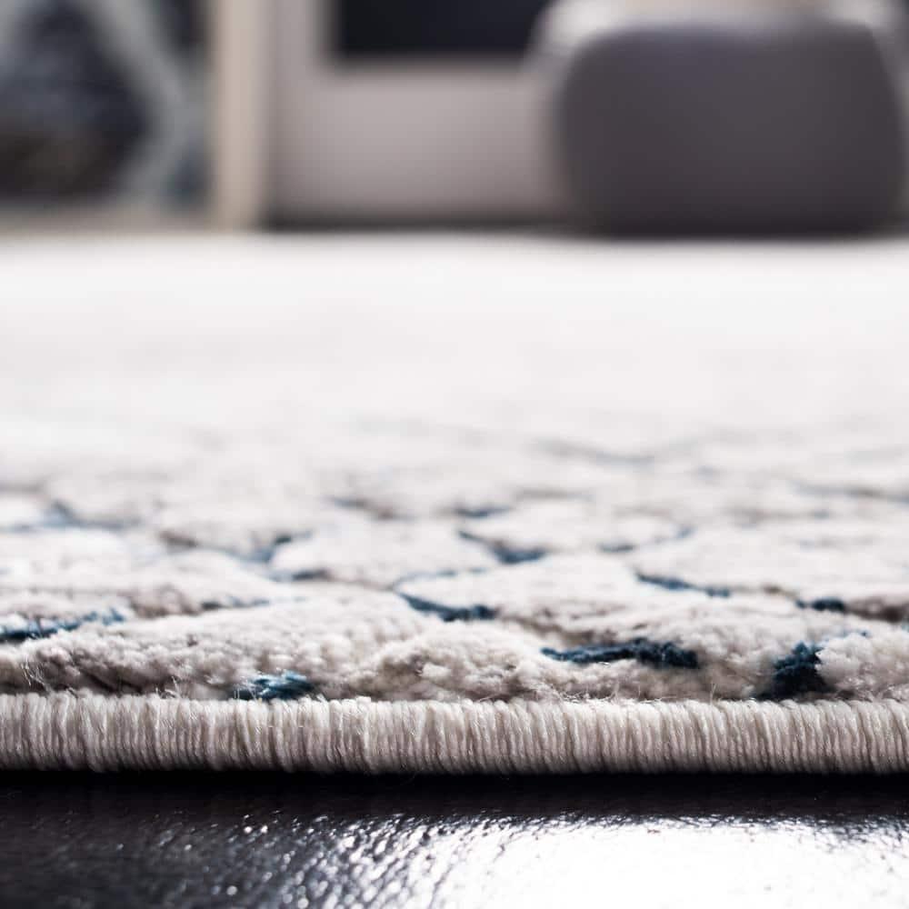 Amalfi AMF552 Power Loomed Area Rug - Cream/Navy - 5'3"x7'6" - Safavieh.