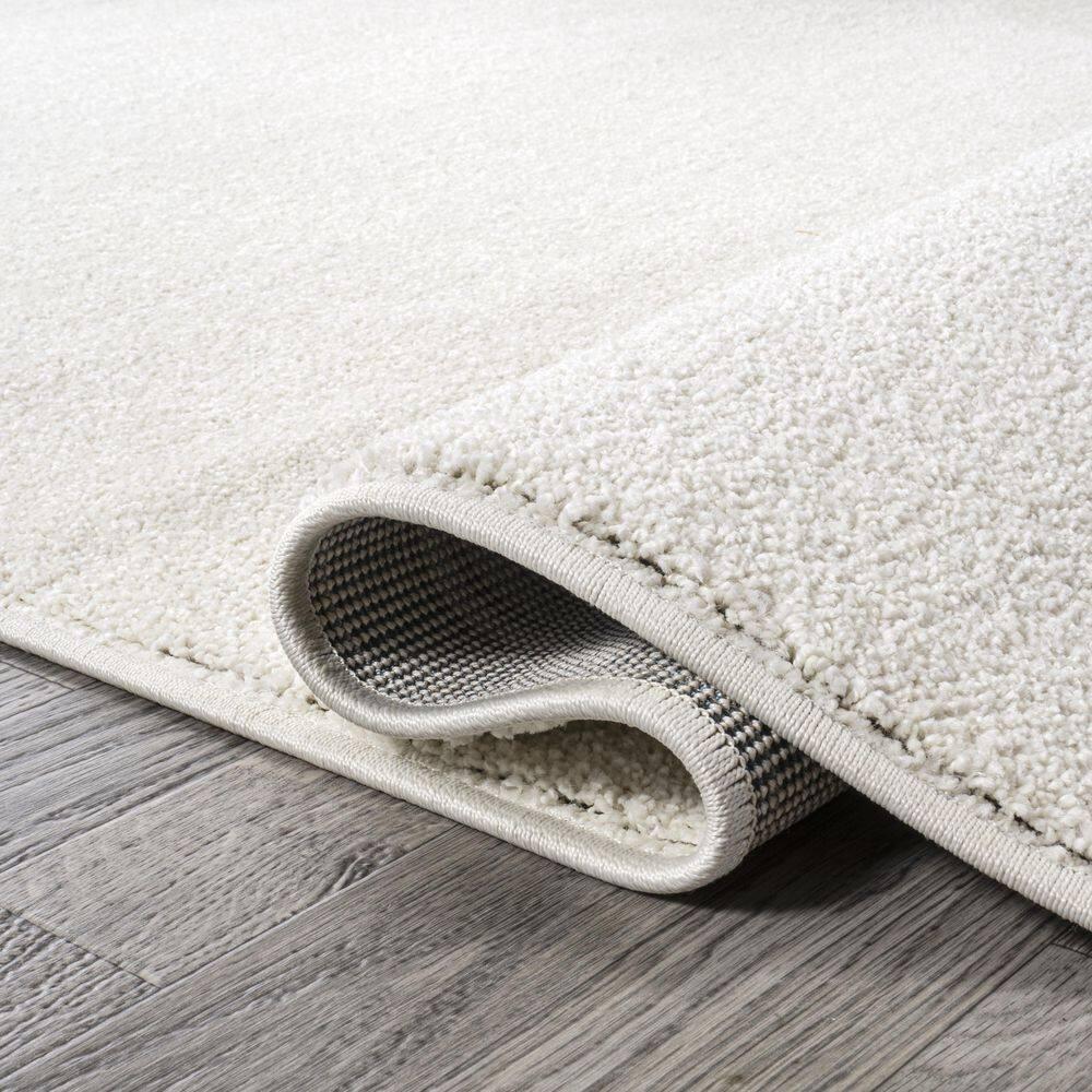3'x5'Oval  Haze Solid Low-Pile, Cream - JONATHAN Y