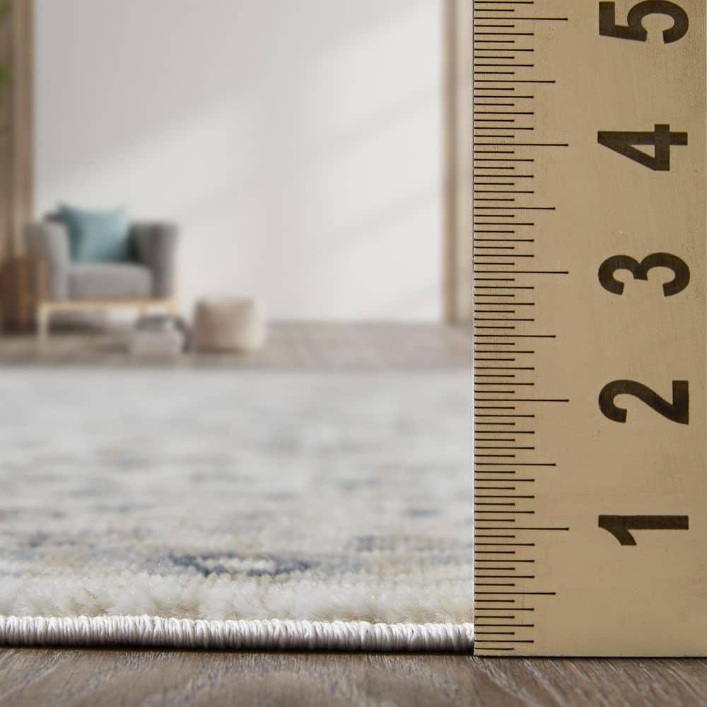 Kehleigh Oviel Cream 9 ft. 10 in. x 12 ft. 10 in. Oriental Polypropylene Indoor Area Rug