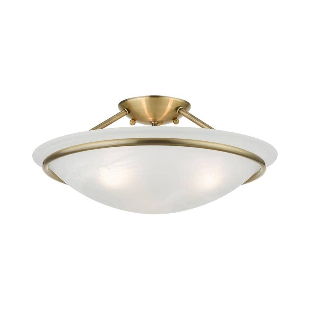 Livex Lighting Newburgh 3 - Light Semi-Flush Mount in Antique Brass
