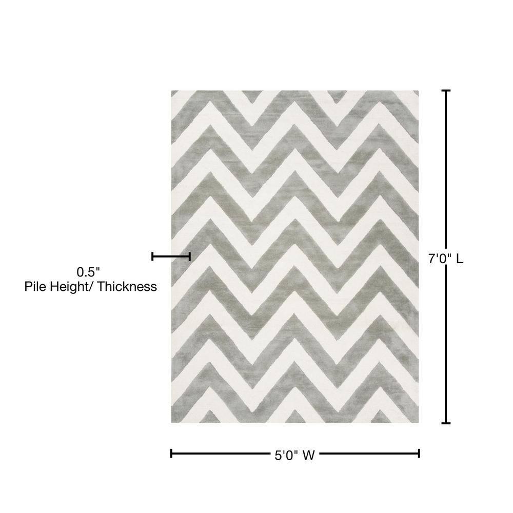 Safavieh Kids SFK921 Hand Tufted Area Rug - Grey/Ivory - 5'x7' - Safavieh.