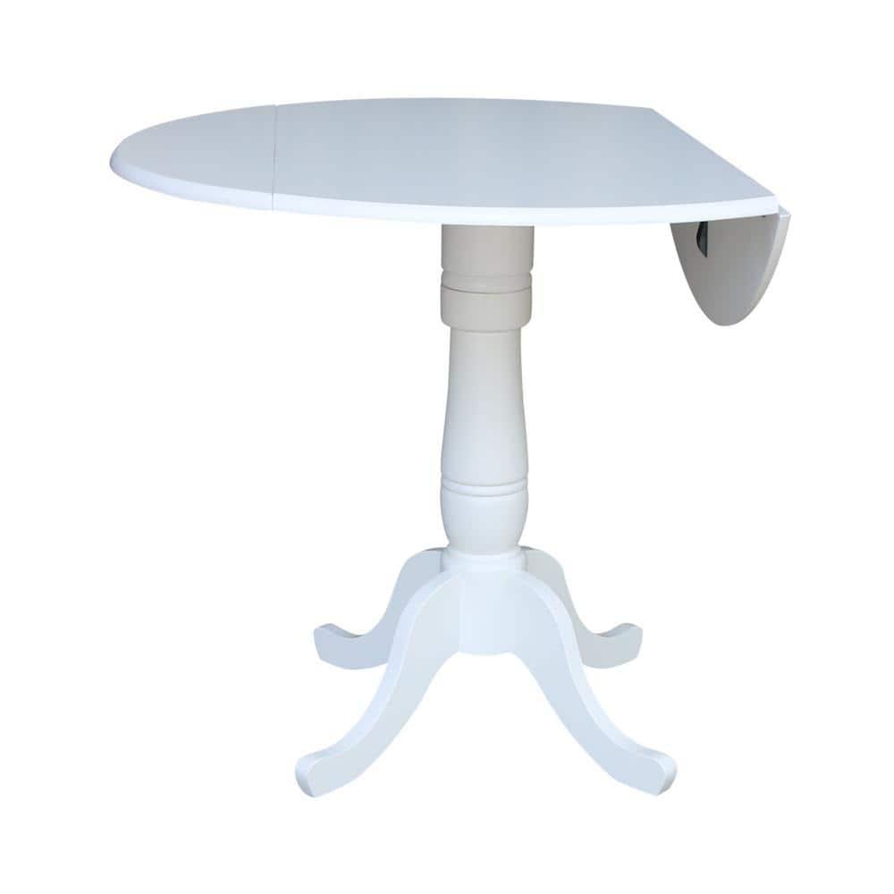 International Concepts 42 In Round dual drop Leaf Pedestal Table - 35.5  inchesH