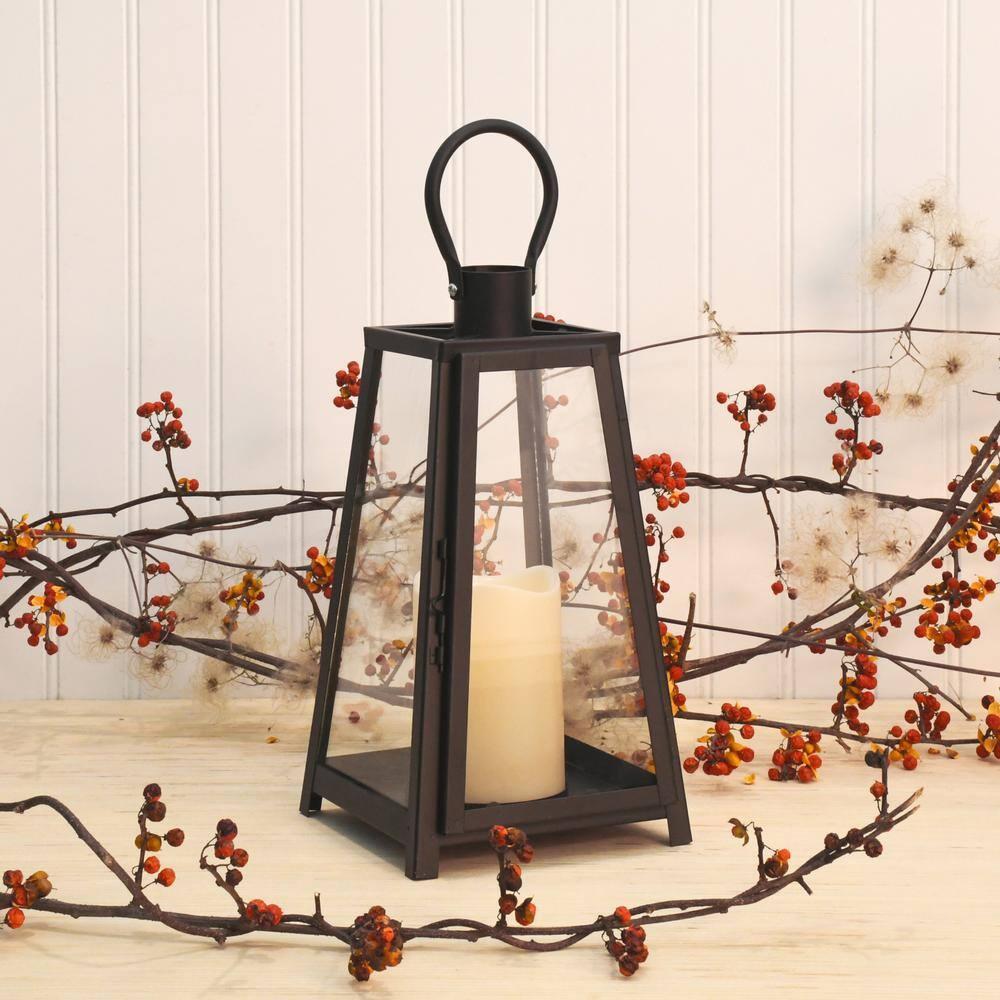 The Holiday Aisle® Black Tapered Metal Lantern with Battery Operated Candle
