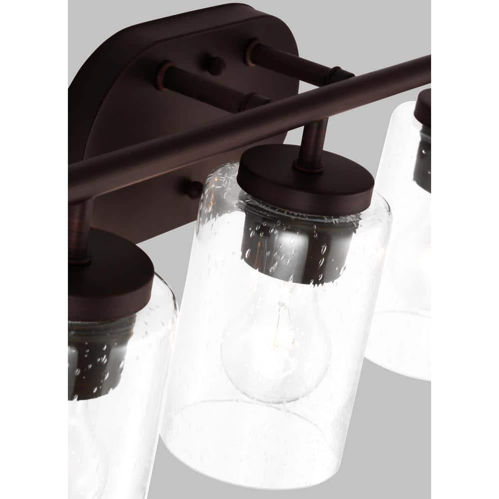 Oslo Bronze 3-Light Vanity Fixture with Clear Seeded Glass