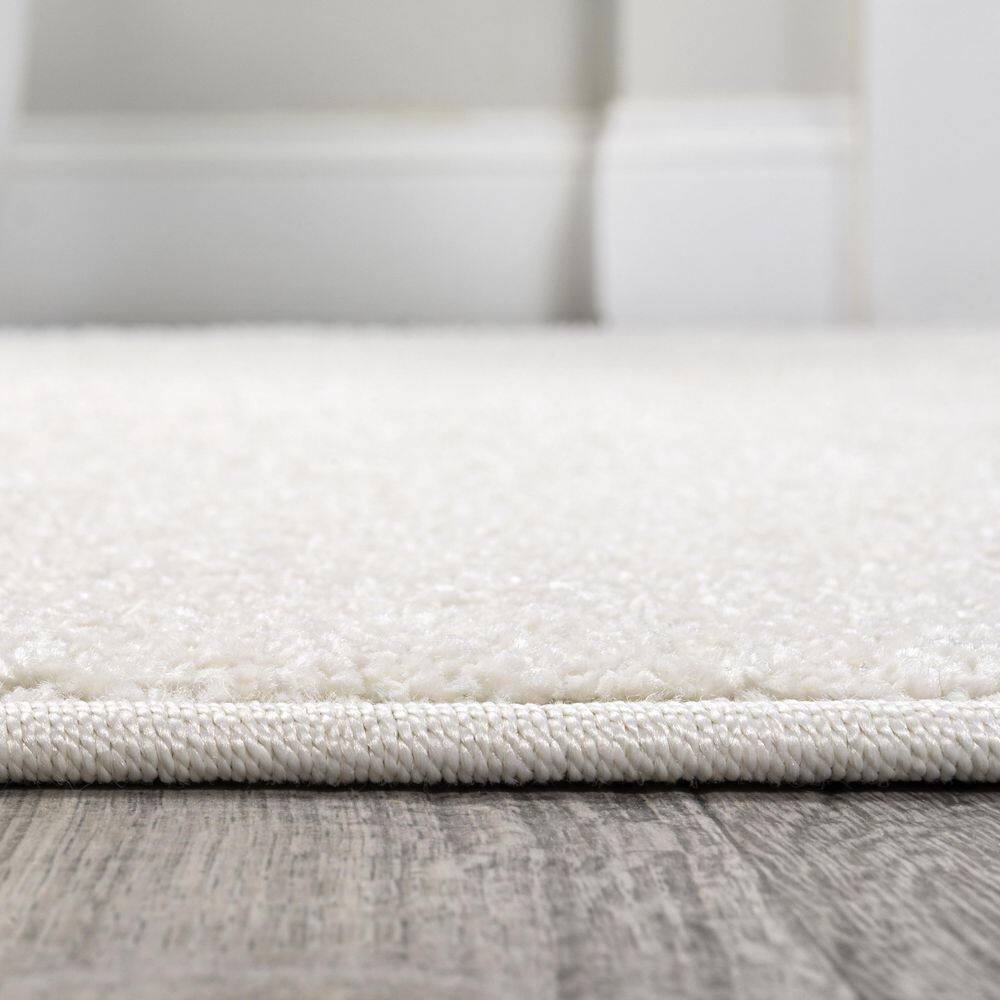 3'x5'Oval  Haze Solid Low-Pile, Cream - JONATHAN Y