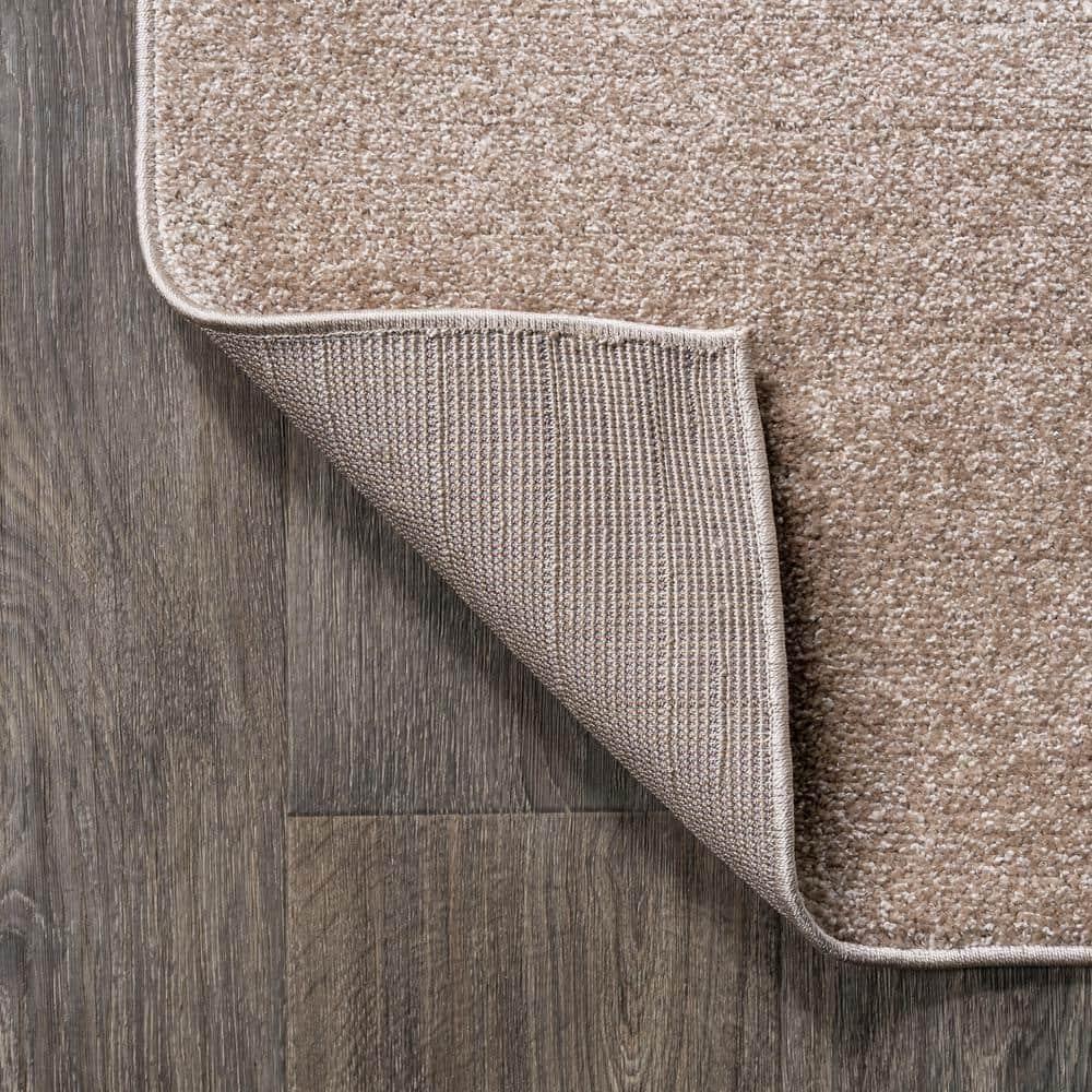 8'x10' Haze Solid Low-Pile Area Rug, Beige - JONATHAN Y