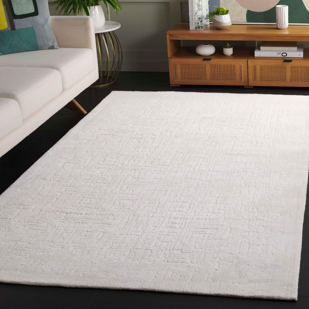 Audrey 4 ft. x 6 ft. Ivory Solid Abstract Area Rug