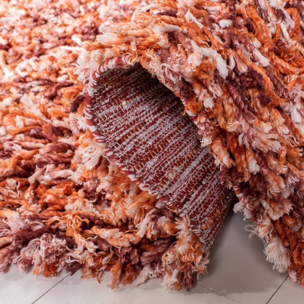 SAFAVIEH Rio Kynaston Solid Polyester Shag Area Rug, Rust/Ivory, 6' x 9'