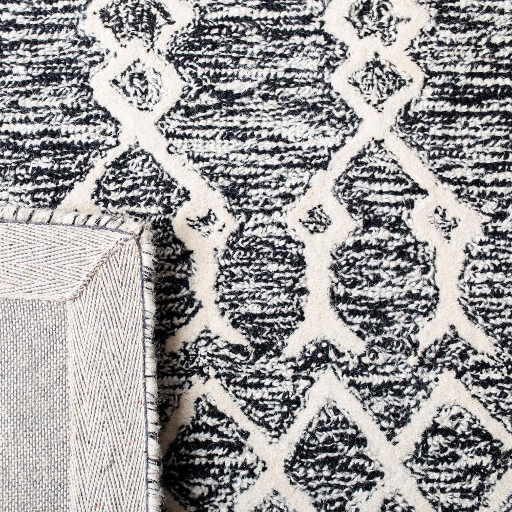 SAFAVIEH Abstract Alastar Geometric Area Rug, Ivory/Black, 9' x 12'