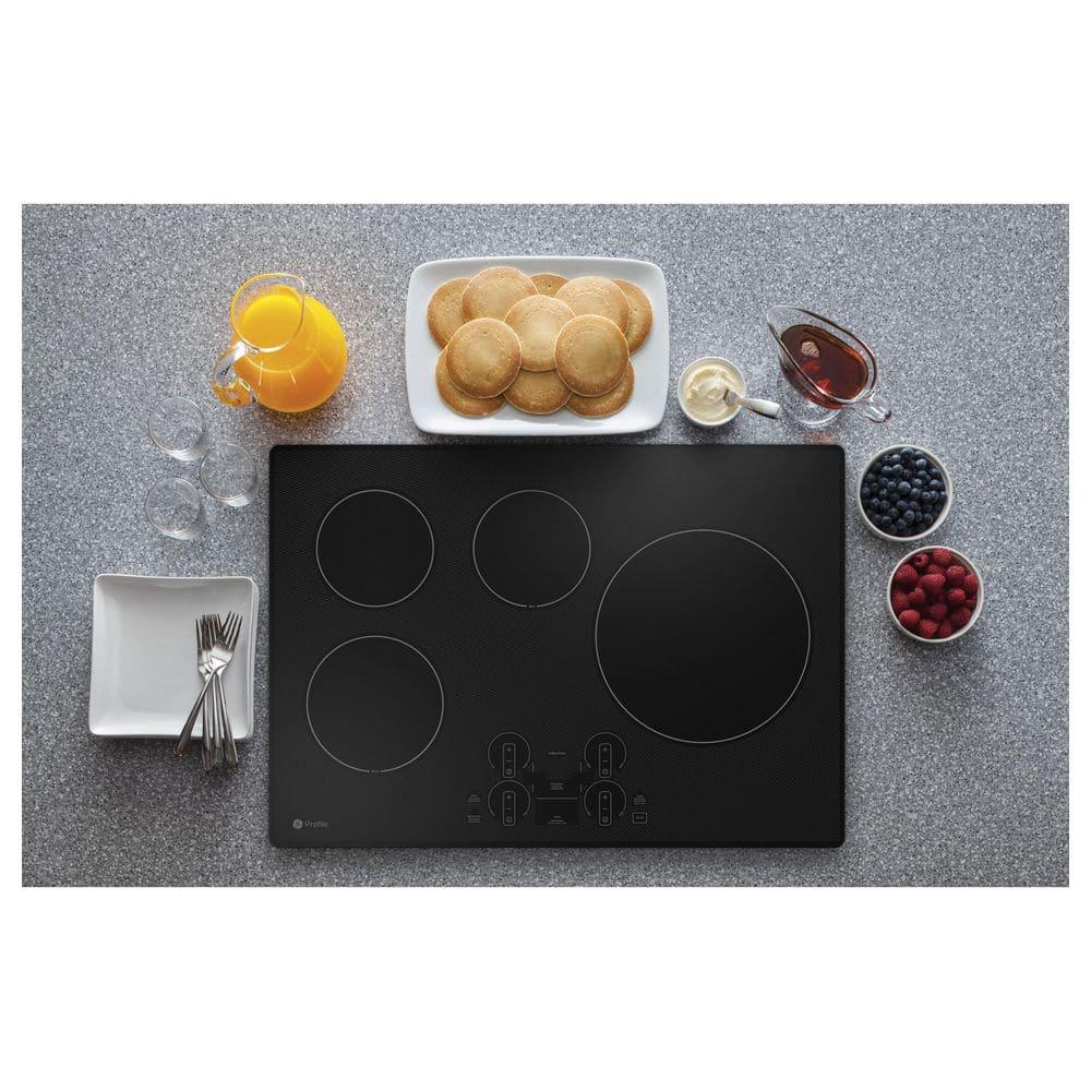 GE Profile™ PHP7030DTBB 29.75" Induction Cooktop with 4 Elements