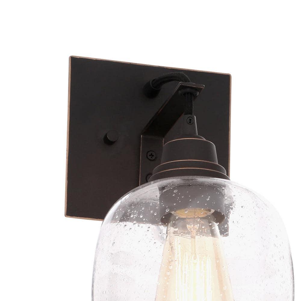 Westinghouse Eldon 1 Light Wall Fixture Oil Rubbed Bronze Finish with Highlights Clear Seeded Glass