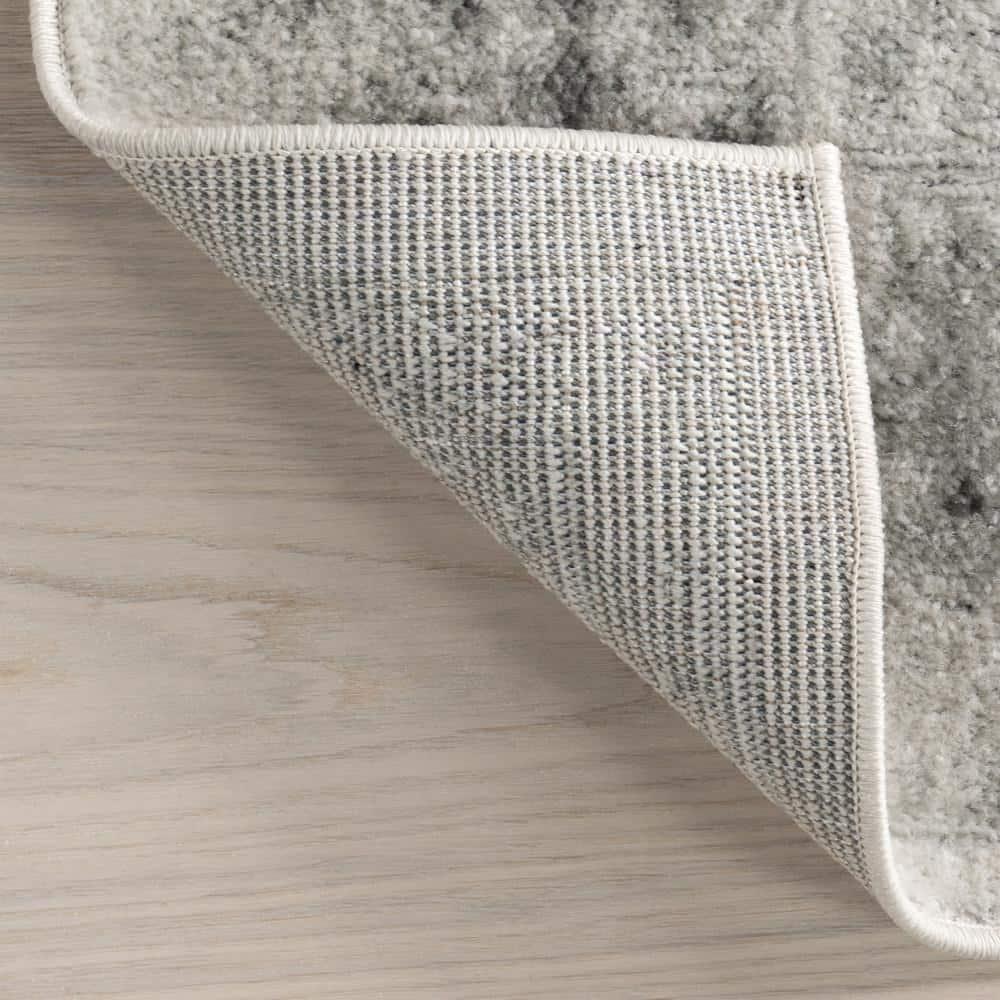 nuLOOM Odell Faded Vintage Ivory 6' 7" x 9' Vintage Area Rug