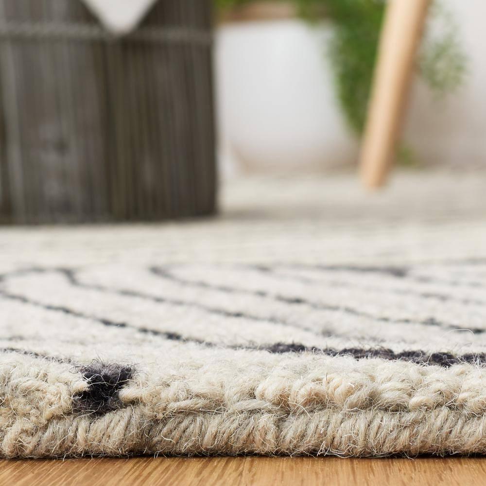 Metro MET451 Hand Tufted Indoor Area Rug - Black/Ivory - 8'x10' - Safavieh