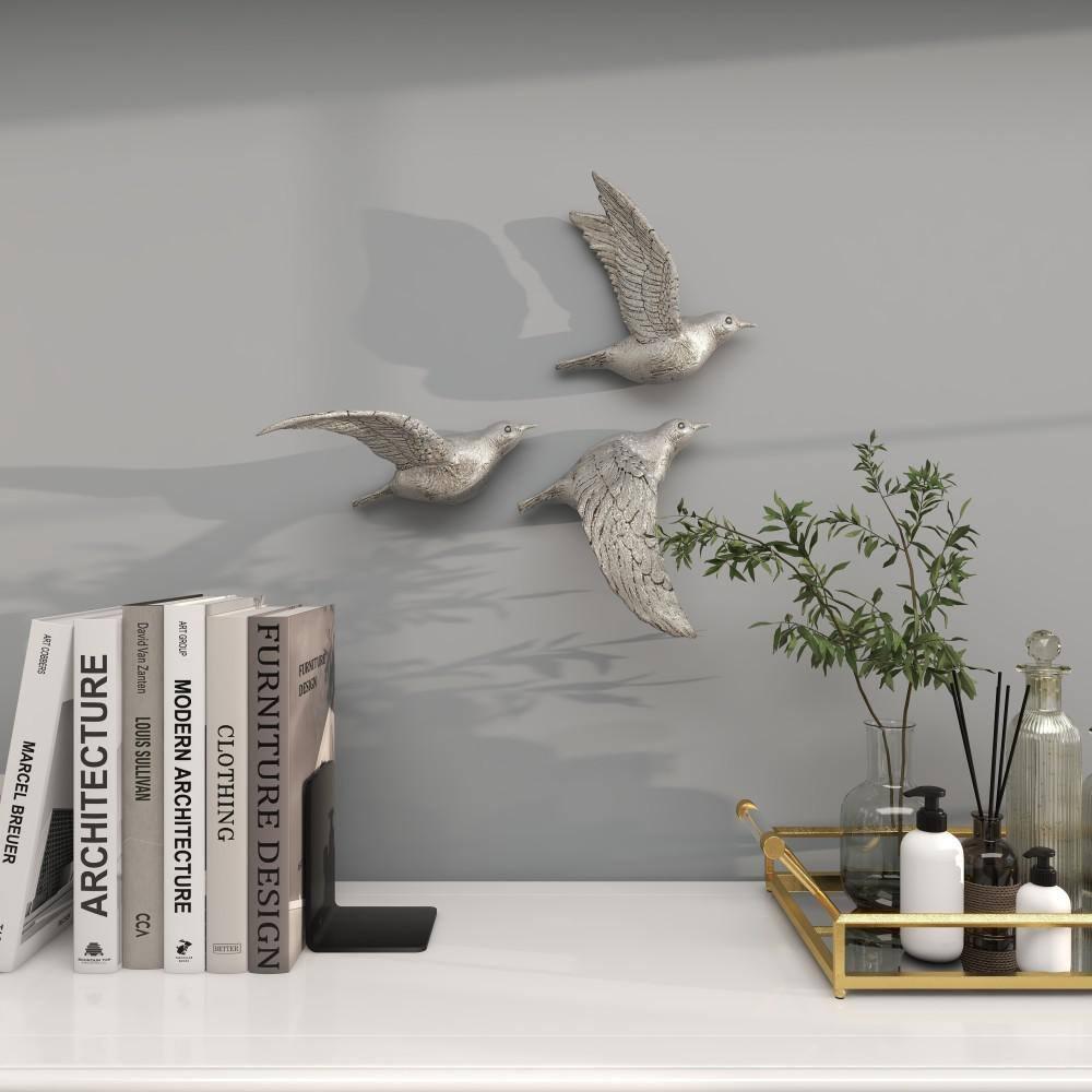 DecMode Silver Polystone Metallic 3D Sculpted Bird Wall Decor (3 Count)