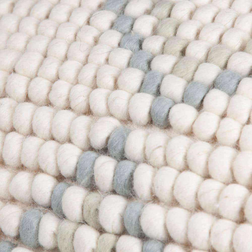Creative Co-Op Cream New Zealand Pouf with Blue & Green Accents