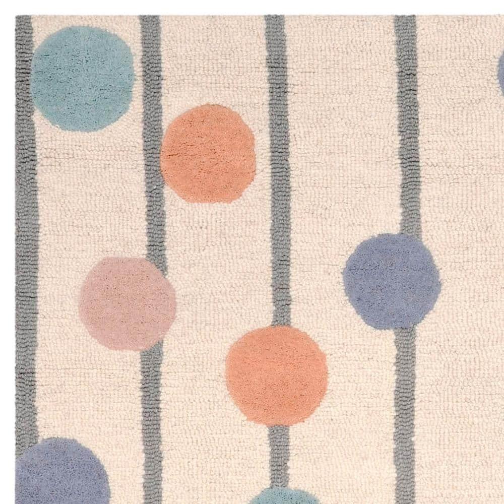 Safavieh Kids Confetti SFK909 Hand Tufted Indoor Accent Rug - Ivory/Multi - 4'x6' - Safavieh