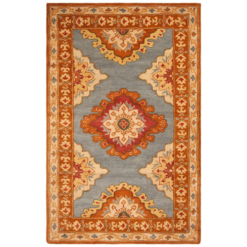 SAFAVIEH Heritage Lewis Traditional Wool Area Rug, Blue/Rust, 6' x 9'