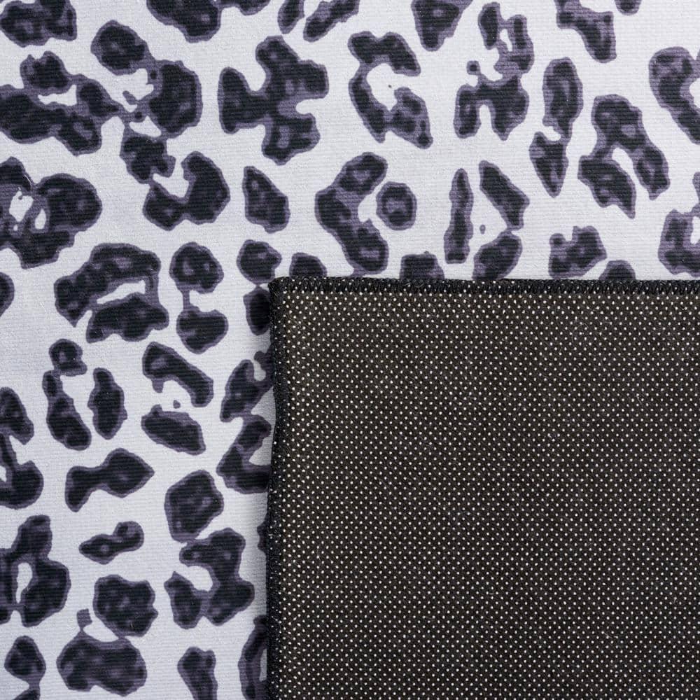 Everly Quinn Faux Hide Performance Machine Washable Animal Print Rug