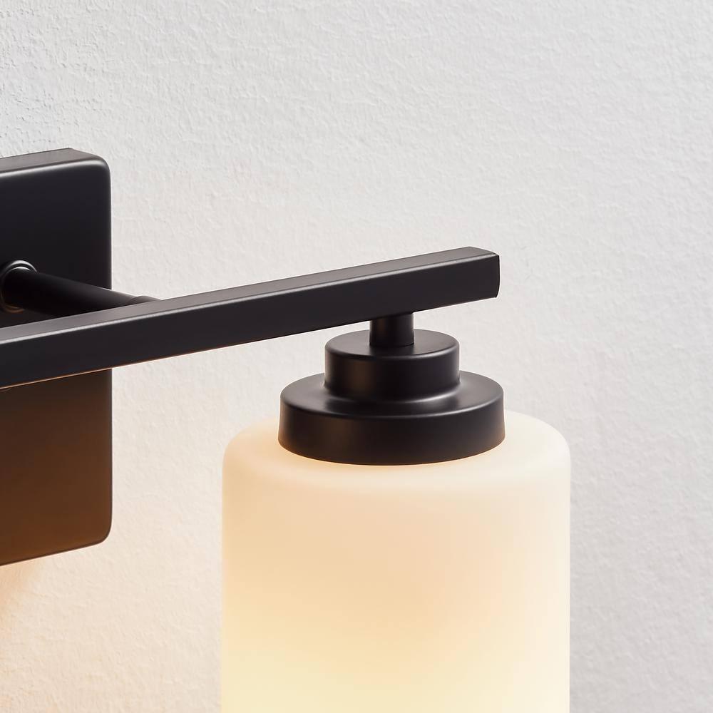 KAWOTI 2-Light Dimmable Bathroom Vanity Light with Frosted White Glass Black