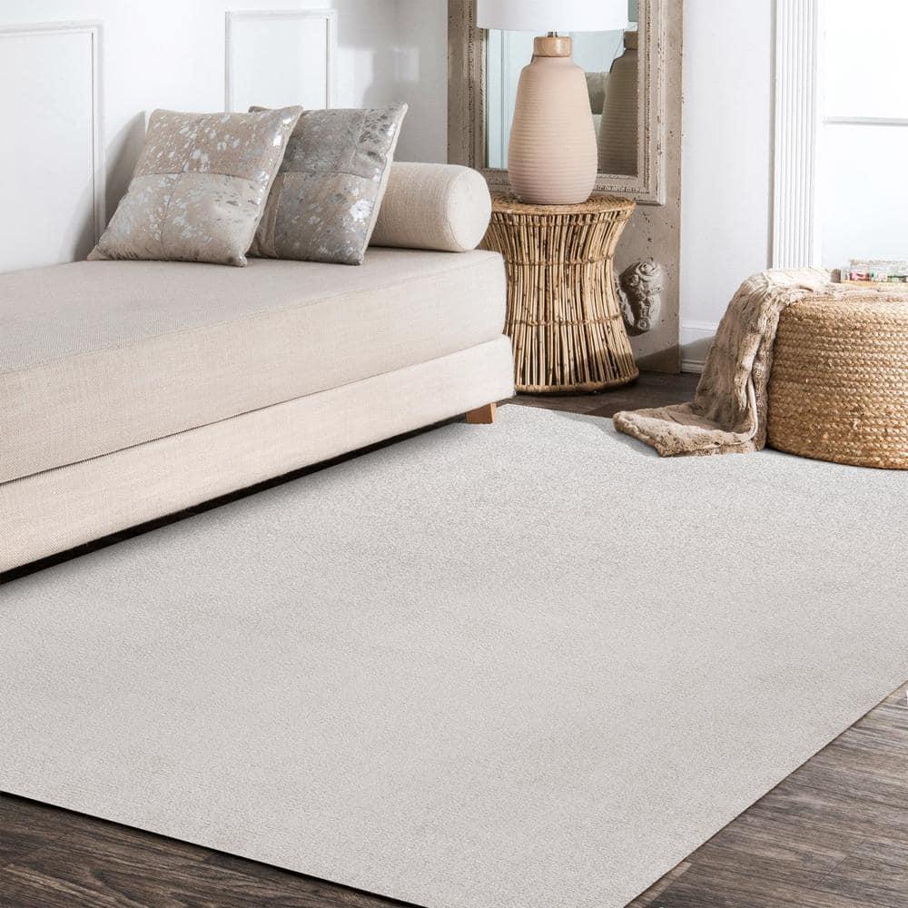 8'x10' Haze Solid Low-Pile Area Rug, Ivory - JONATHAN Y