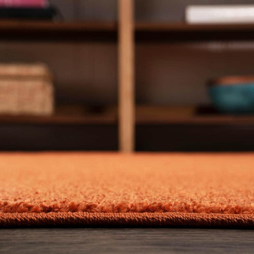 8'x10' Haze Solid Low-Pile Area Rug, Orange - JONATHAN Y