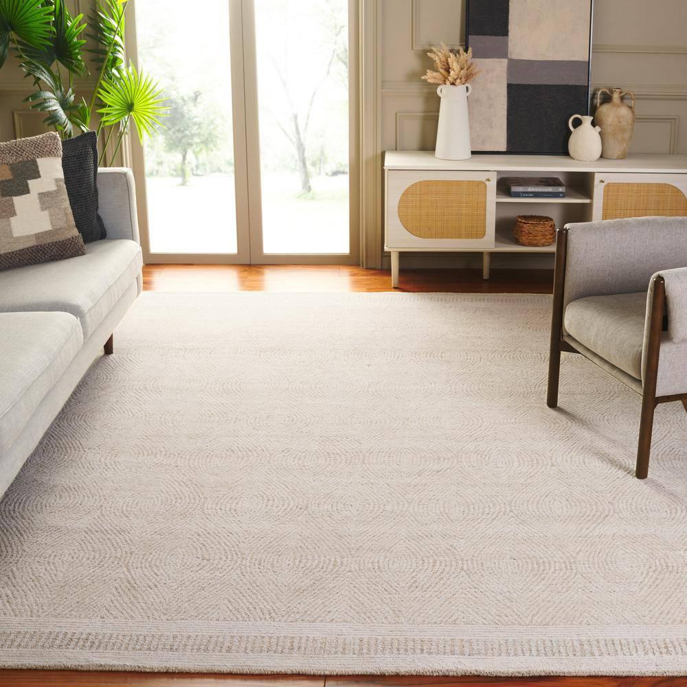 Ivory and Beige 6' x 9' Handmade Wool Abstract Area Rug